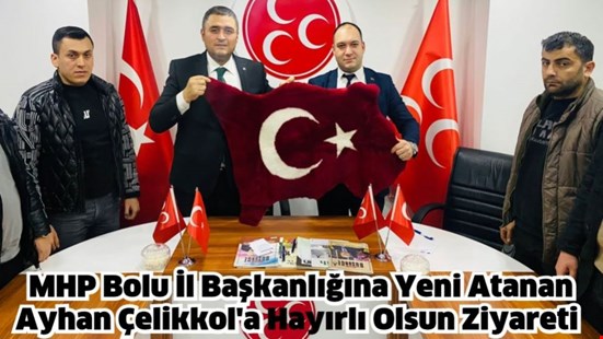 Milliyetçi Hareket Partisi’nin Bolu İl Başkanı Ayhan Çelikkol tebrikleri kabul ediyor.