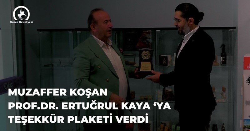 MUZAFFER KOŞAN PROF.DR. ERTUĞRUL KAYA ‘YA TEŞEKKÜR PLAKETİ VERDİ